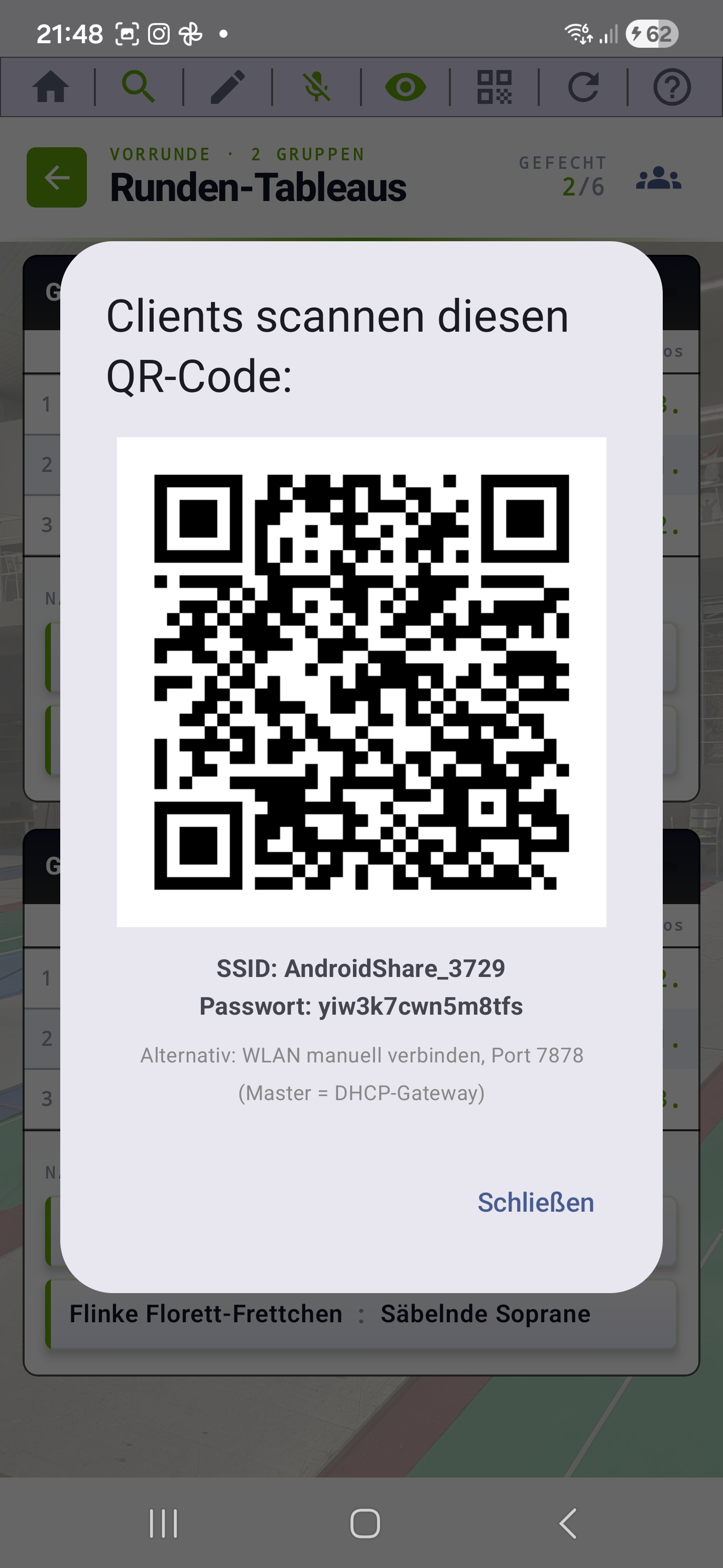QR-koddialog med SSID, lösenord och anvisning för klientenheter